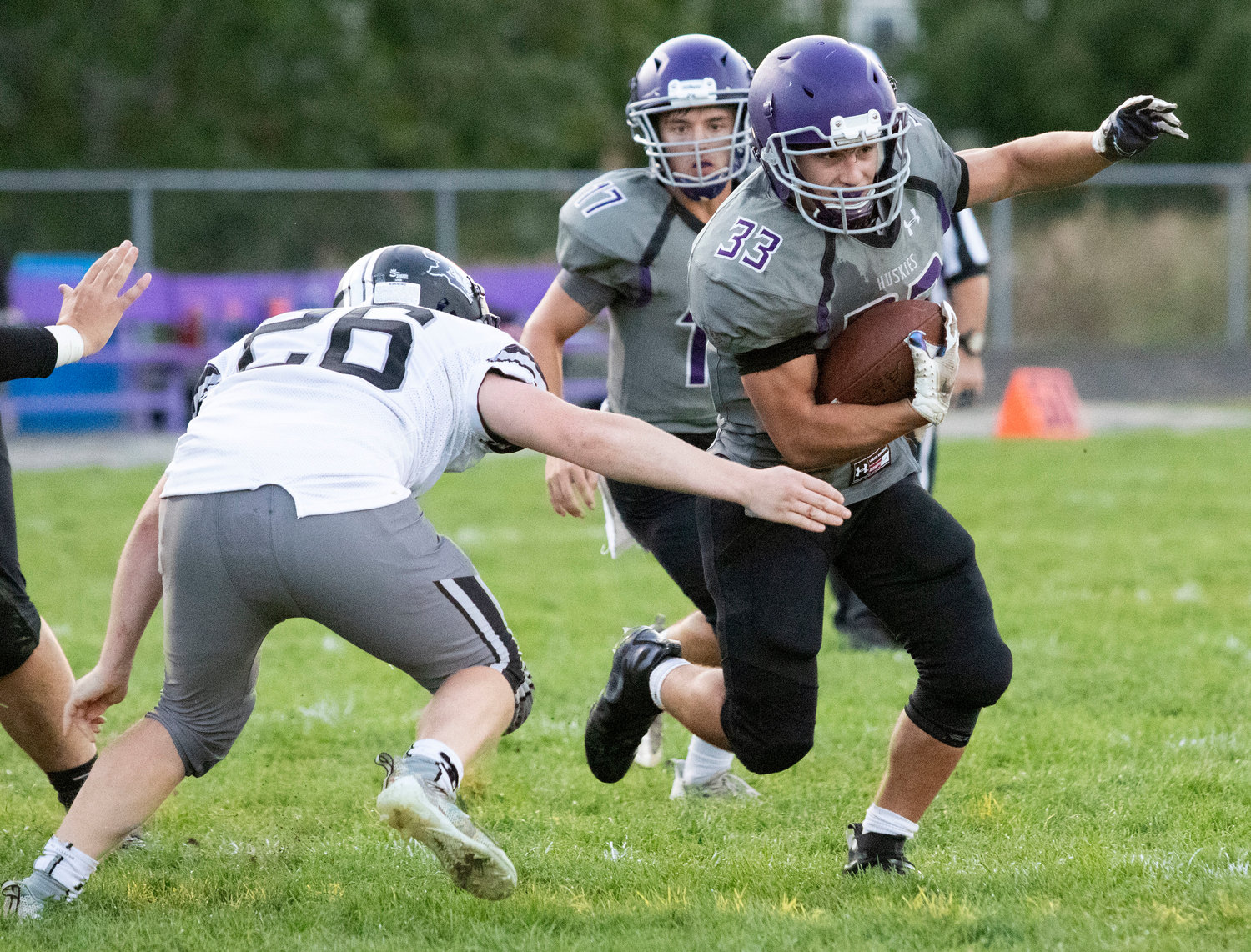 Huskies senior running back Brock Pacheco rushed for 117 yards and a touchdown during the loss to Pilgrim. Quarterback Riley Howland looks on.
