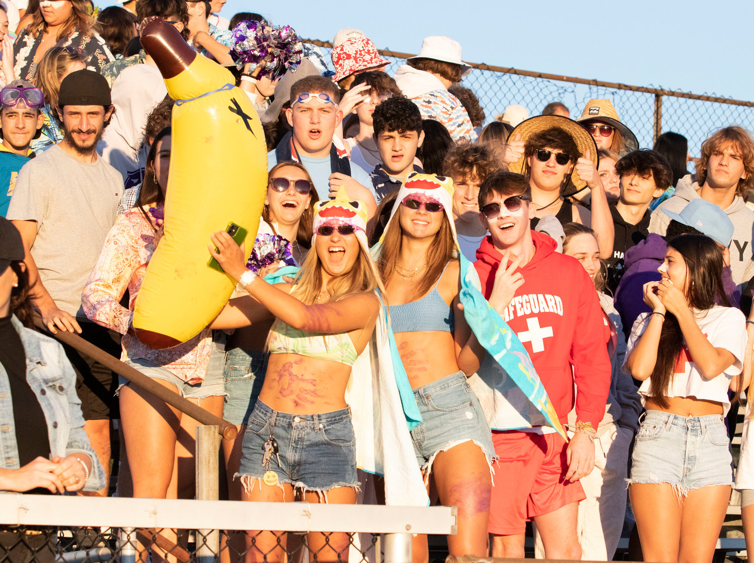 The Huskies Dog Pound went with a beach party theme for the Huskies first home football game on Thursday.
