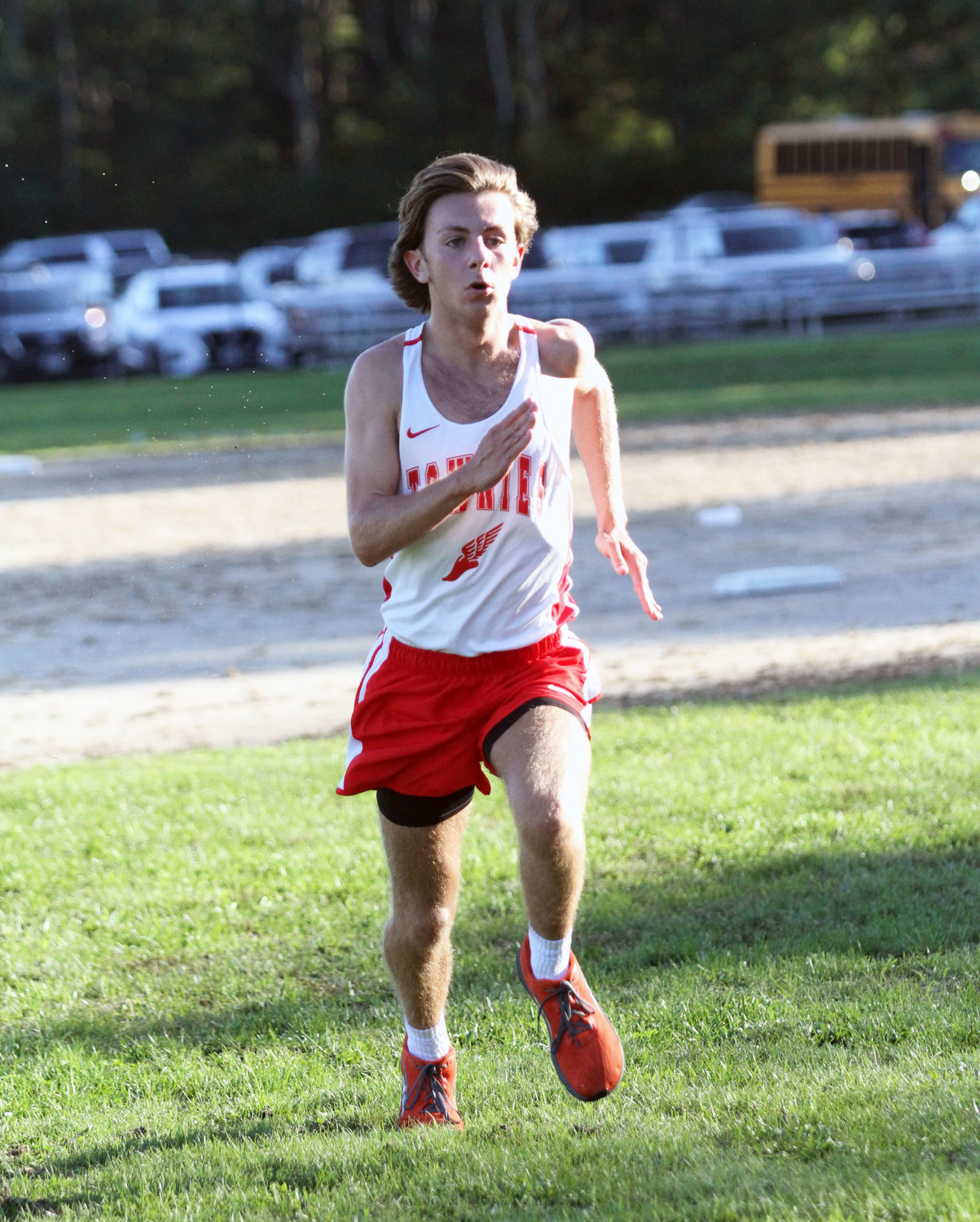 Tyler Robinson nears the finish line as the top runner for the EPHS boys' cross country squad in the Townies' recent meet at Tiverton.