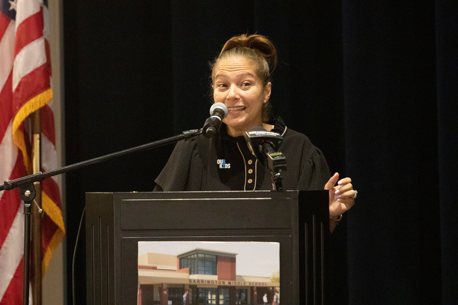 RI Commissioner of Education Angélica Infante-Green speaks to the crowd during the special Green Ribbon Award ceremony last week.