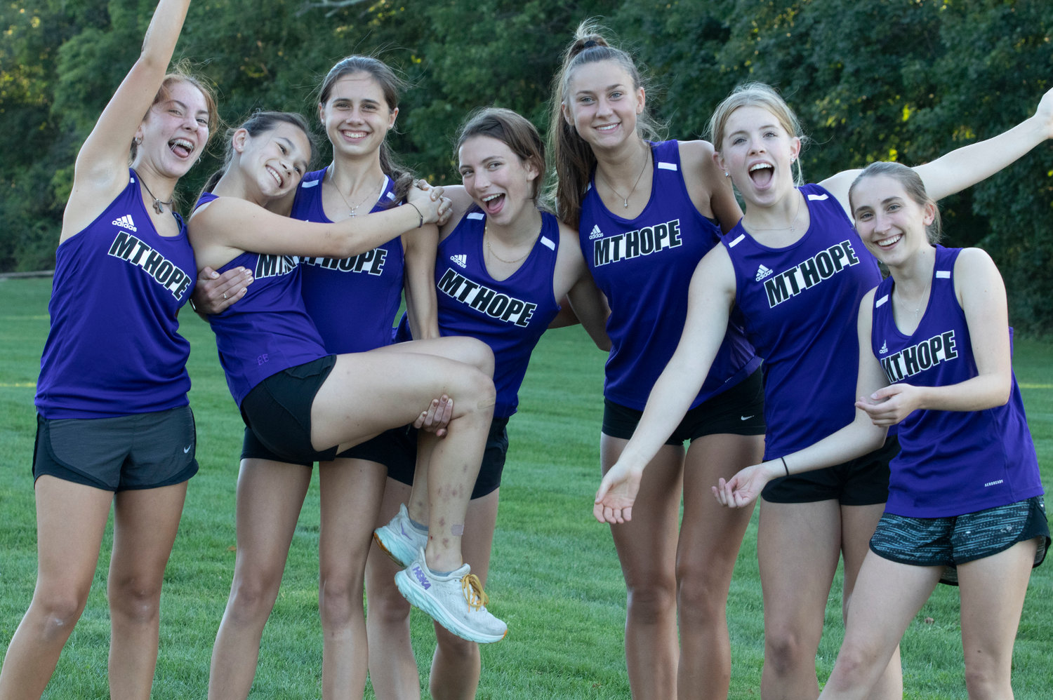 The Huskies girls cross country team from left, Analucia Romero, Ryan Coffey, Jessica Deal, Sonia Bradley, Reyn Ferris, Lily Dasilveira, and Lucy O’Brien, posted their best regular season record ever at 8-3, according to coach Susan Rancourt. The team is waiting their fate about qualifying for states as a team.