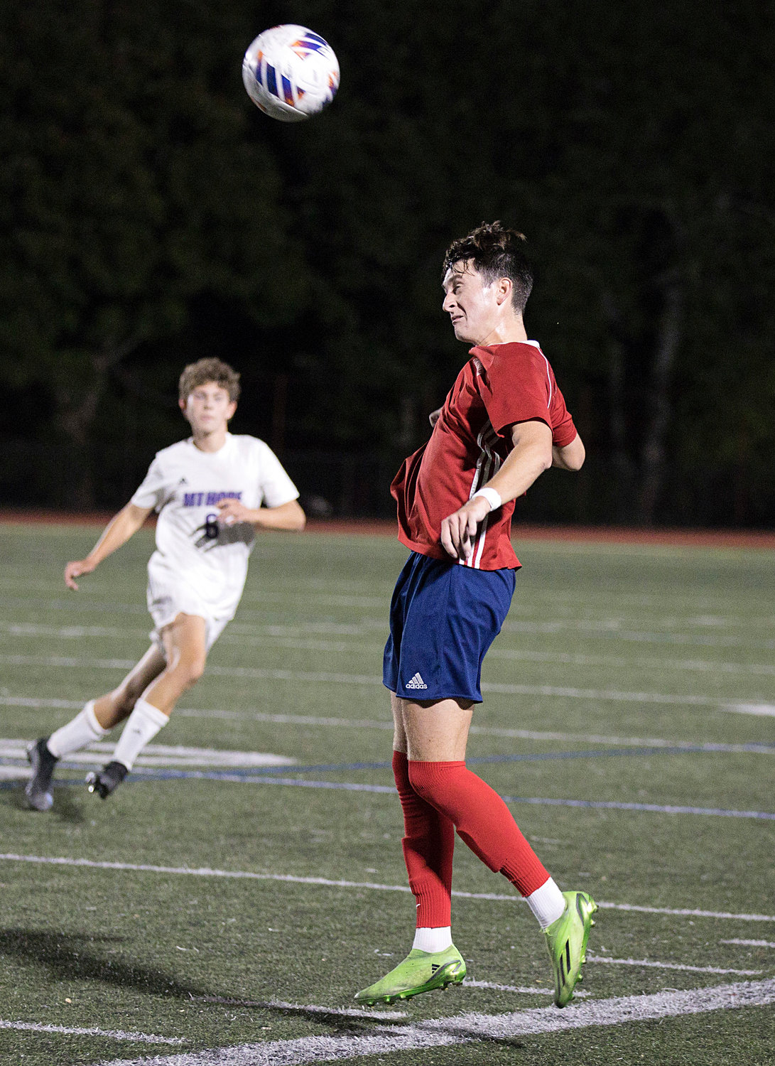 Noah Phelan uses his head to trap a pass while battling Mt. Hope on Wednesday.