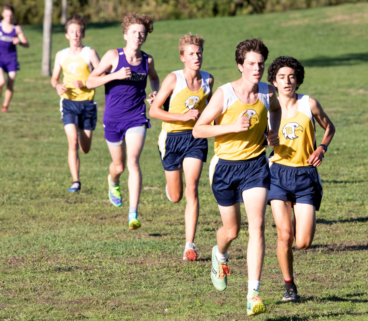 A group fo Barrington runners, led by Christopher Clyne, compete in a recent dual meet at Colt State Park.