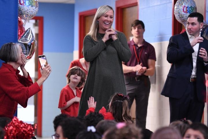 Hennessey Elementary School third grade teacher Emily Rendine walks into the reception before receiving the 2022 Milken Educator Award.