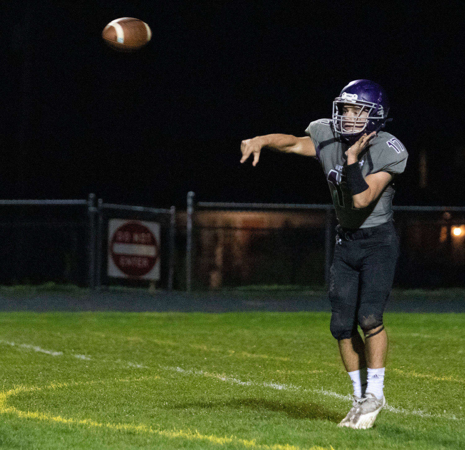 Huskies quarterback Riley Howland throws a screen pass to Ben Colouro in the fourth quarter. Colouro caught it and ran 78-yards for a touchdown.