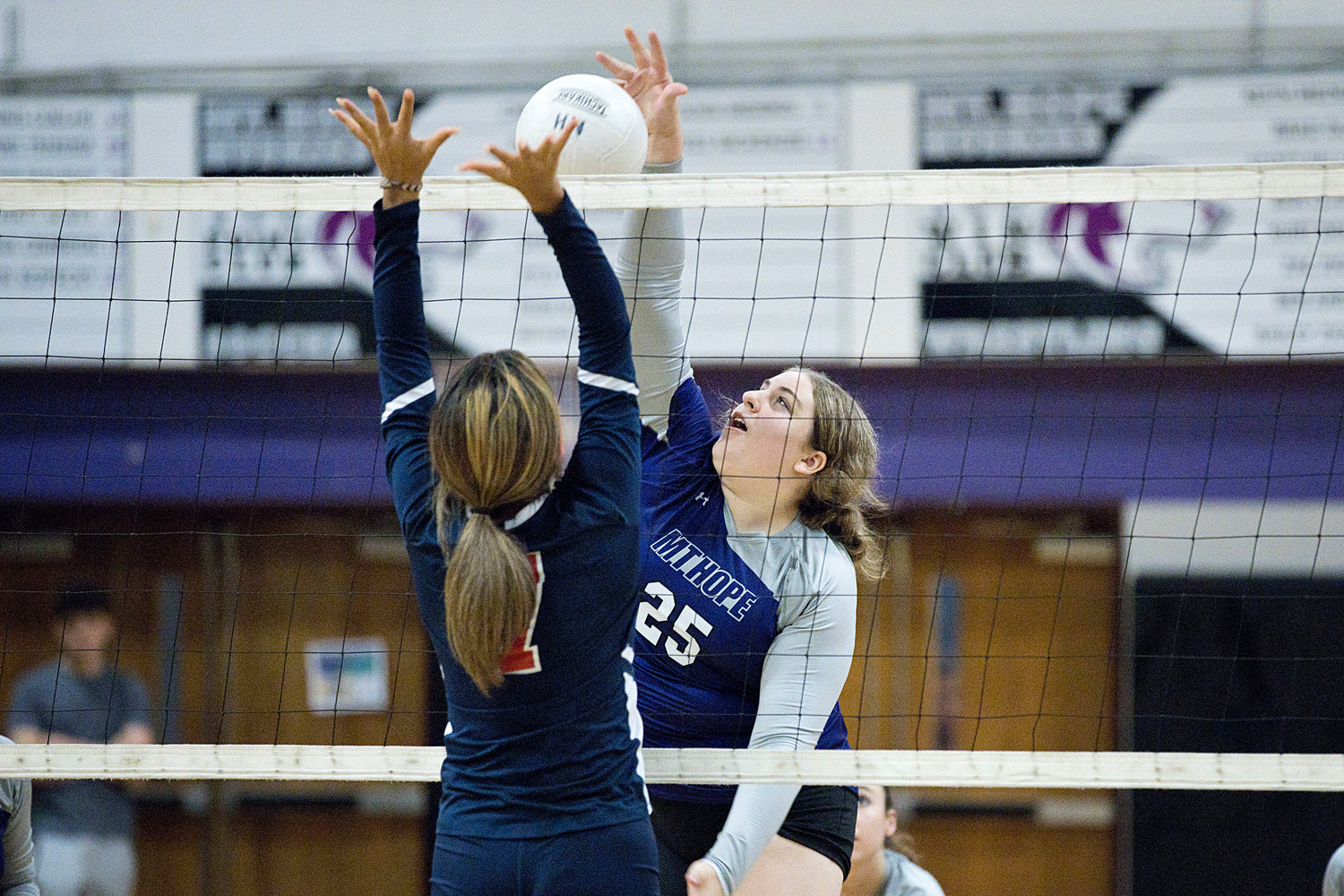 Gianna Lunney sends the ball back over the net while rallying with Lincoln, Tuesday. 