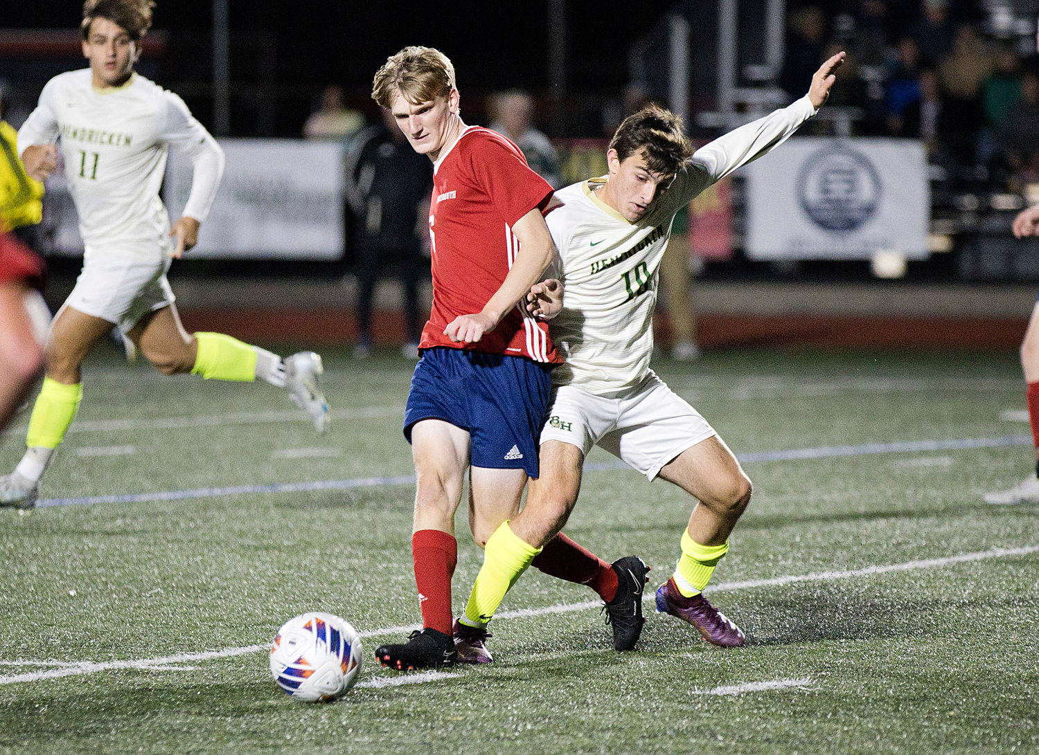 Owen Francis steps into a pass under the pressure of a Hendricken opponent.