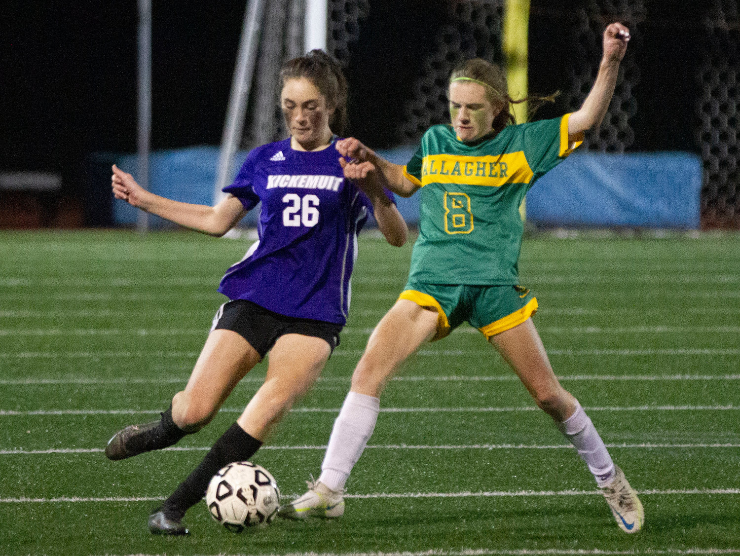 Vivienne Noonan fights for a throw in.