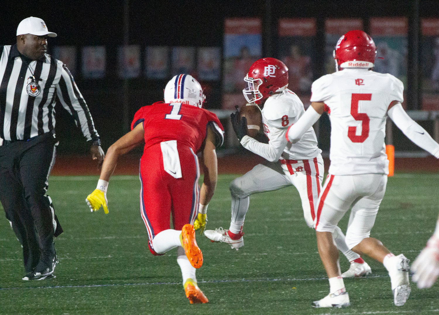 Jahad Davis Pinto recovers a fumble for the Townies in their playoff game against the Patriots.