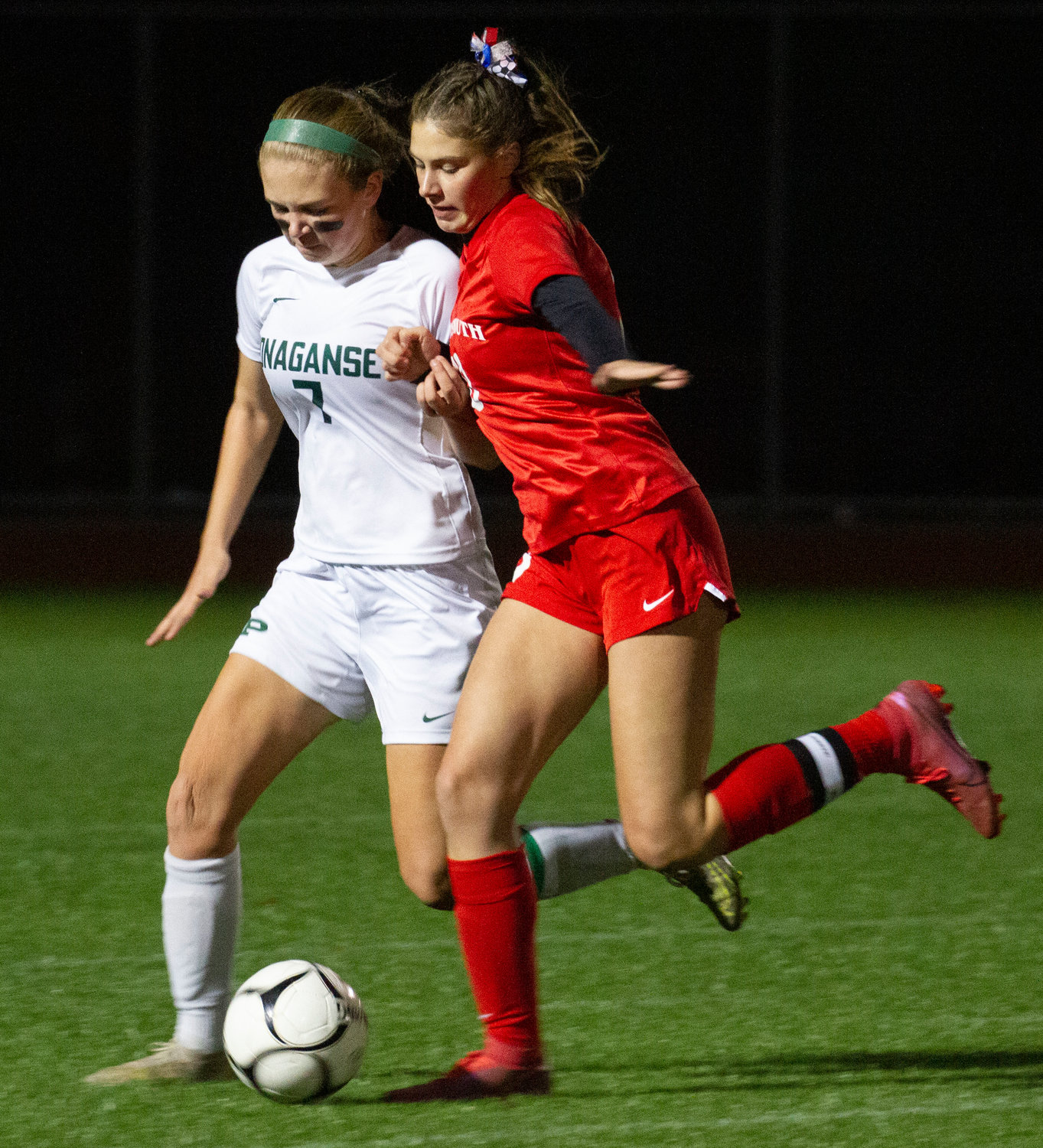 Portsmouth’s Kaitlin Roche dribbles by a defender and attempts to make a run at the goal against East Greenwich during Wednesday night’s semifinal matchup. The Patriots won, 5-0, and advanced to play in the Division II championship game at 2:30 p.m. on Saturday, Nov. 12, at Cranston Stadium.