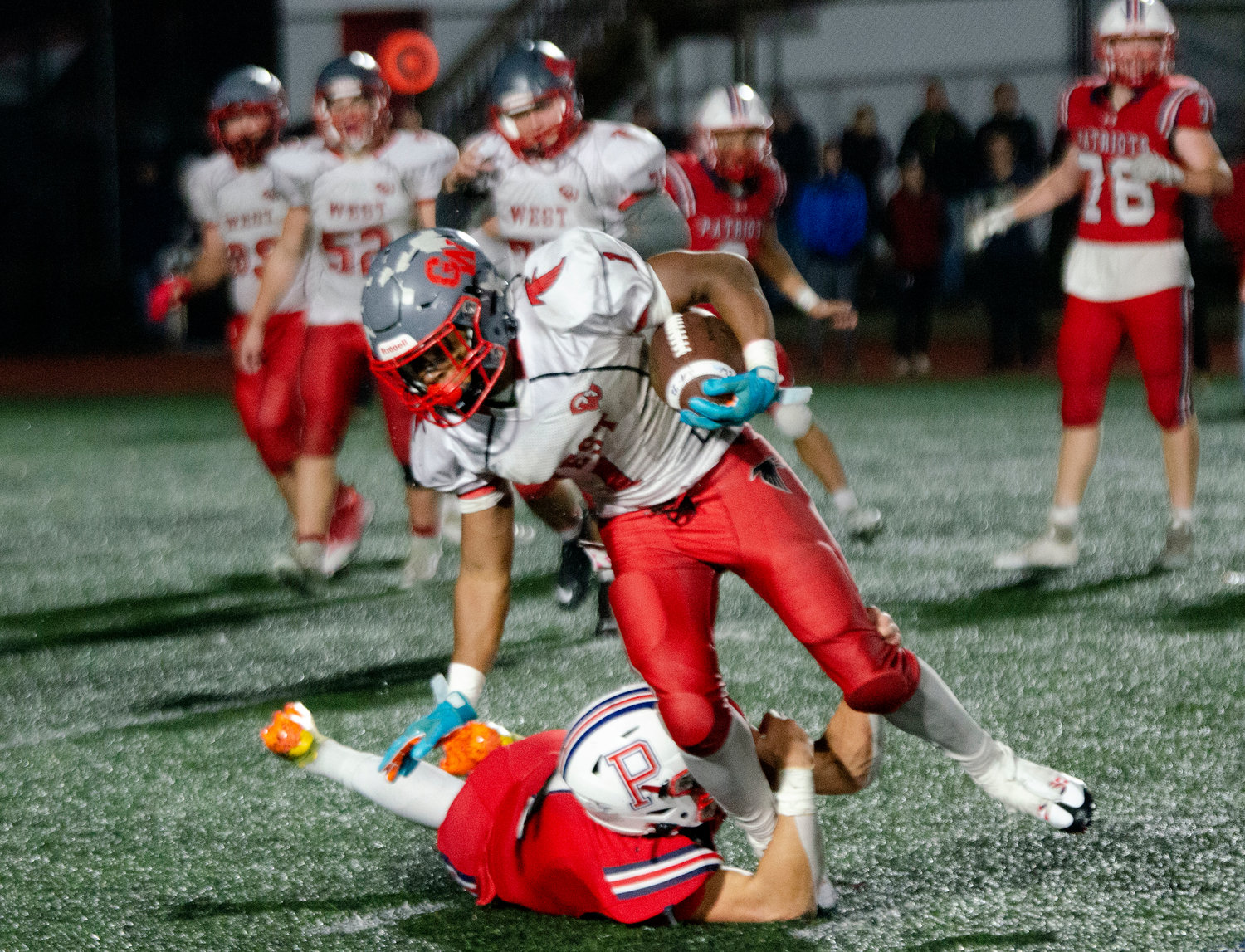 Carson Conheeney makes a tackle on running back Marcus Chung in the second half.