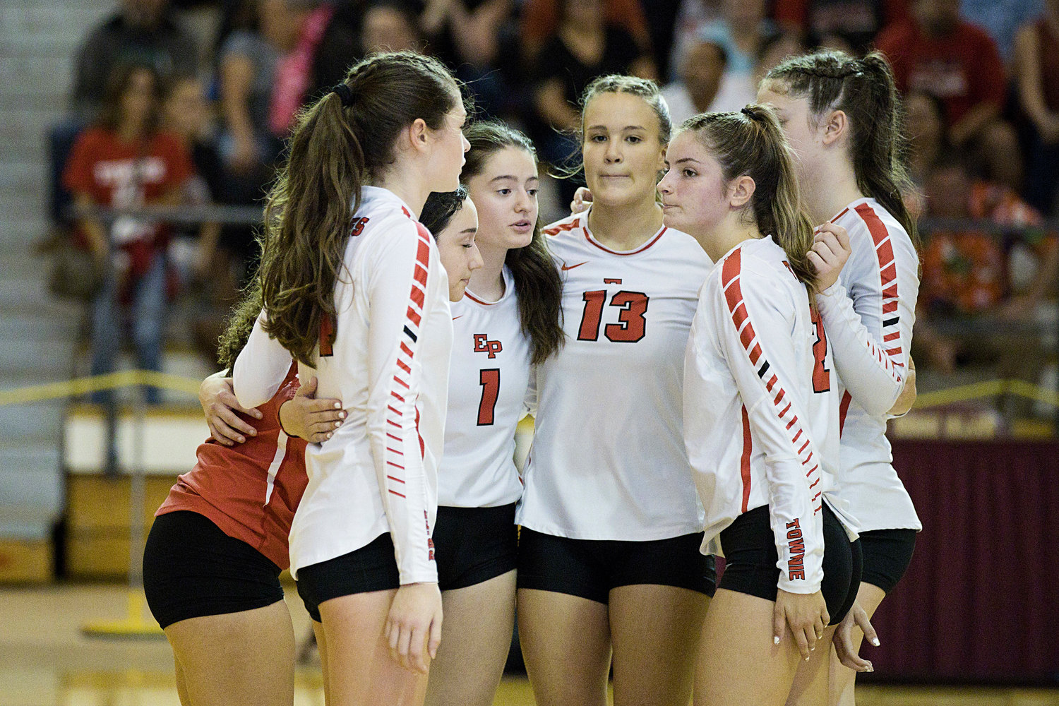 East Providence High School girls' volleyball players leave the court following their 3-0 loss to Chariho in the Division II title match Saturday, Nov. 12, at Rhode Island College.