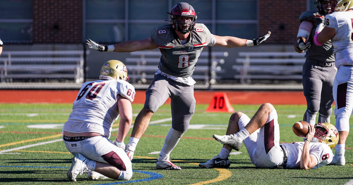 Barrington High School product Zach Newberg, a junior defensive lineman on the WPI football team, celebrates one of his three sacks against Norwich late last month.