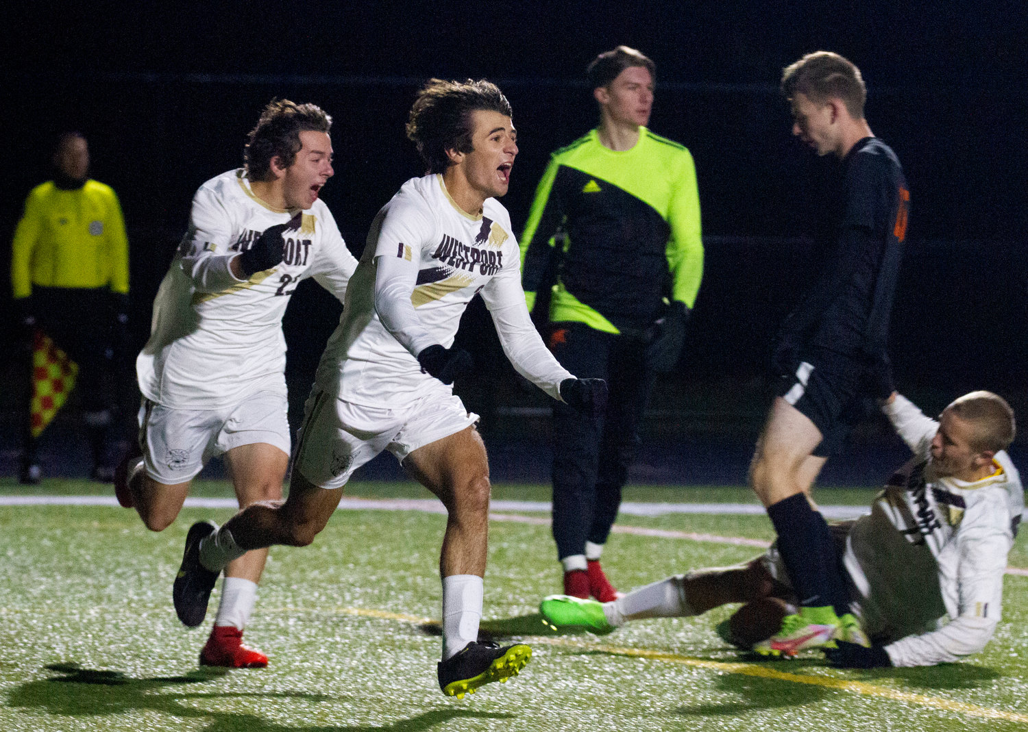 Senior midfielder Tyler Arraial and striker Hunter Brodeur race to the sideline in celebration after Brodeur’s goal broke a 0-0 tie with six minutes to play.