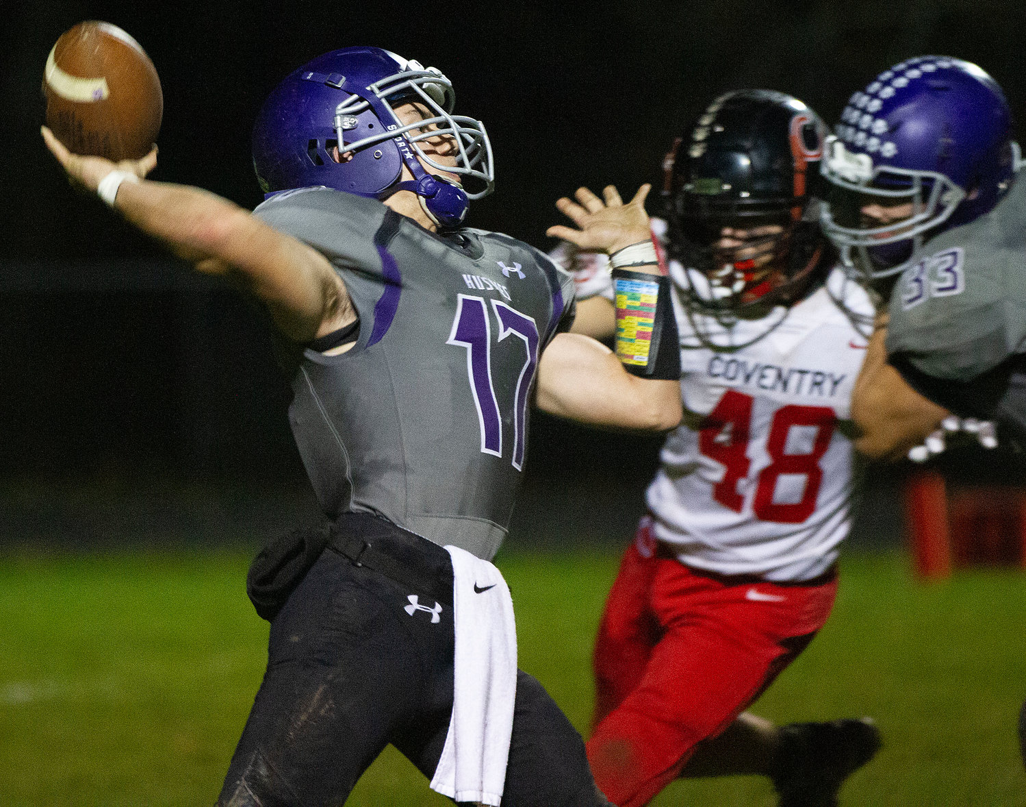 Quarterback Riley Howland heaves a pass to Ben Colouro to set up a Brock Pacheco score in the third quarter.