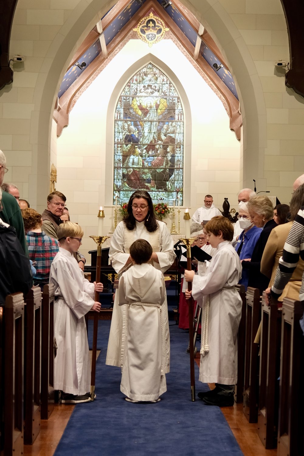 A group of children assist The Rev. Meaghan Kelly Brower during the Nov. 13 morning service at St. Mary’s Episcopal Church.
