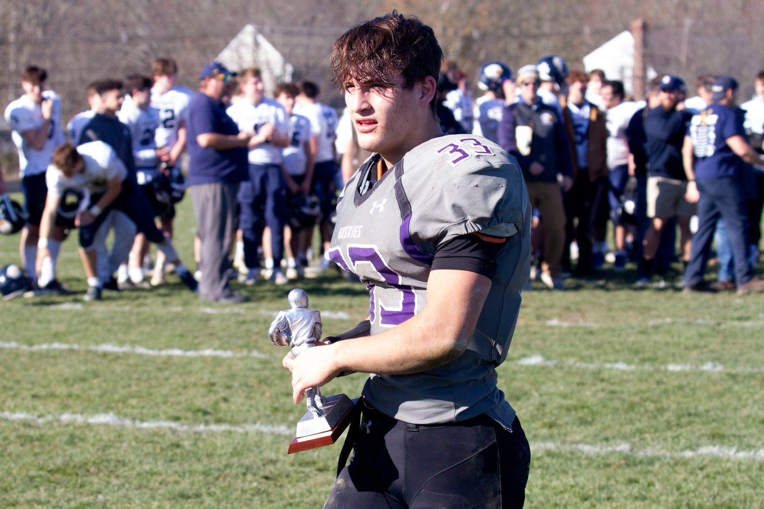 Running back Brock Pacheco collected the Thanksgiving Day MVP trophy for Mt. Hope.