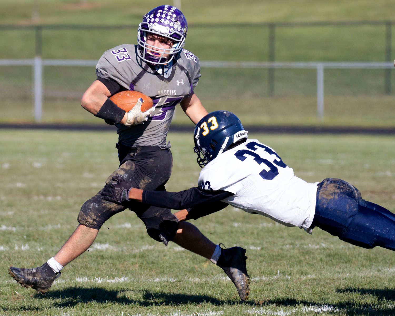 Brock Pacheco breaks a tackle during Mt. hope's loss to Barrington on Thanksgiving Day. Pacheco rushed for 154 yards and two touchdowns and shattered both the single season rushing record and touchdown records for Mt. Hope High School.