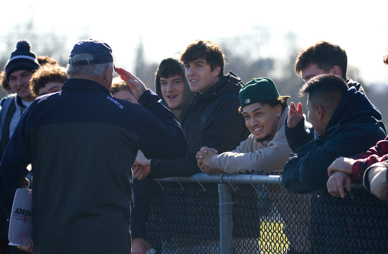 Barrington head coach Sandy Gorham salutes his former former football troops who came to Bristol to view the game.
