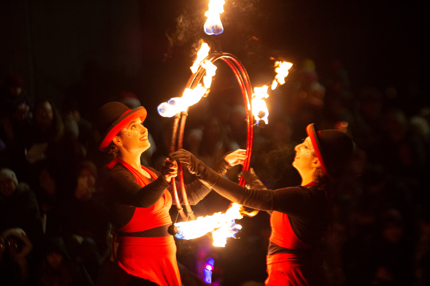 Fire performers from Circus Dynamics thrilled the large crowd on Narragansett Avenue. 