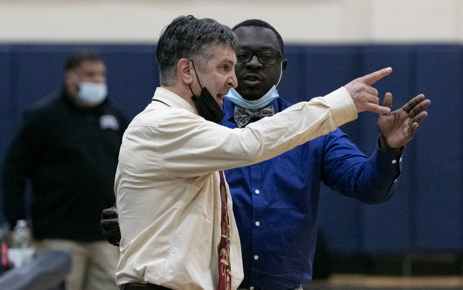 Head coach Scot Boudria and assistant coach Lloyd Aurora during the Paulo Freire game last season.