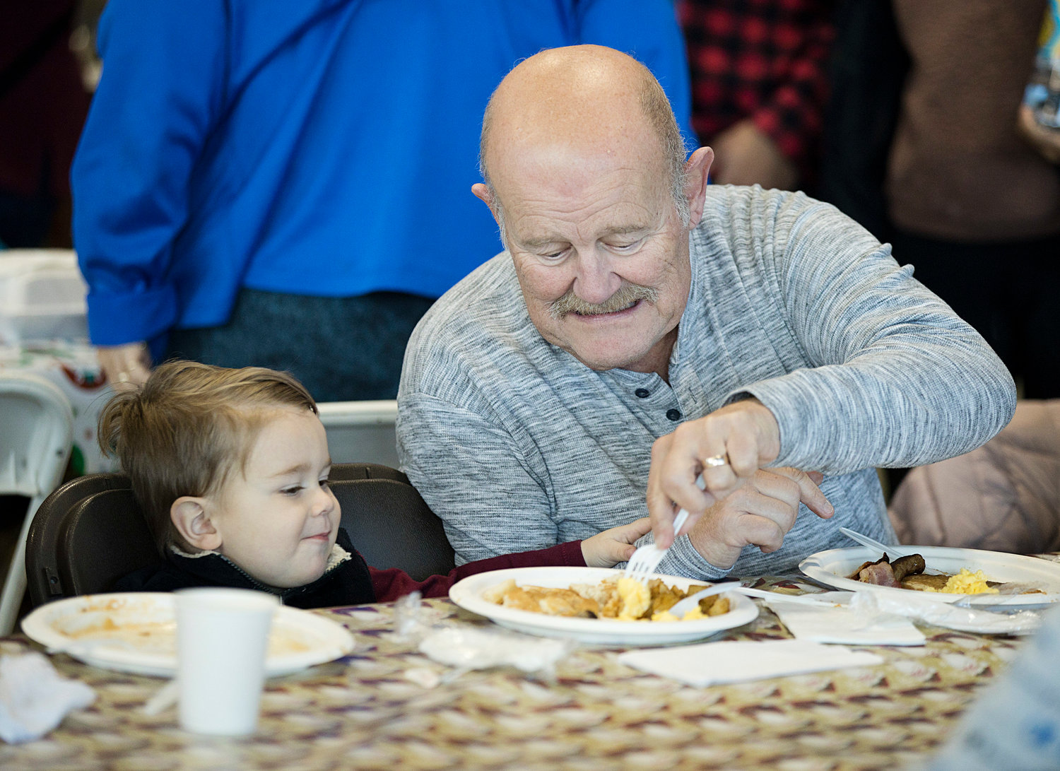 Bristol firefighter, Ed Jernigan, enjoys breakfast with his grandson, Colton Jones at Central Fire Company, Sunday. 