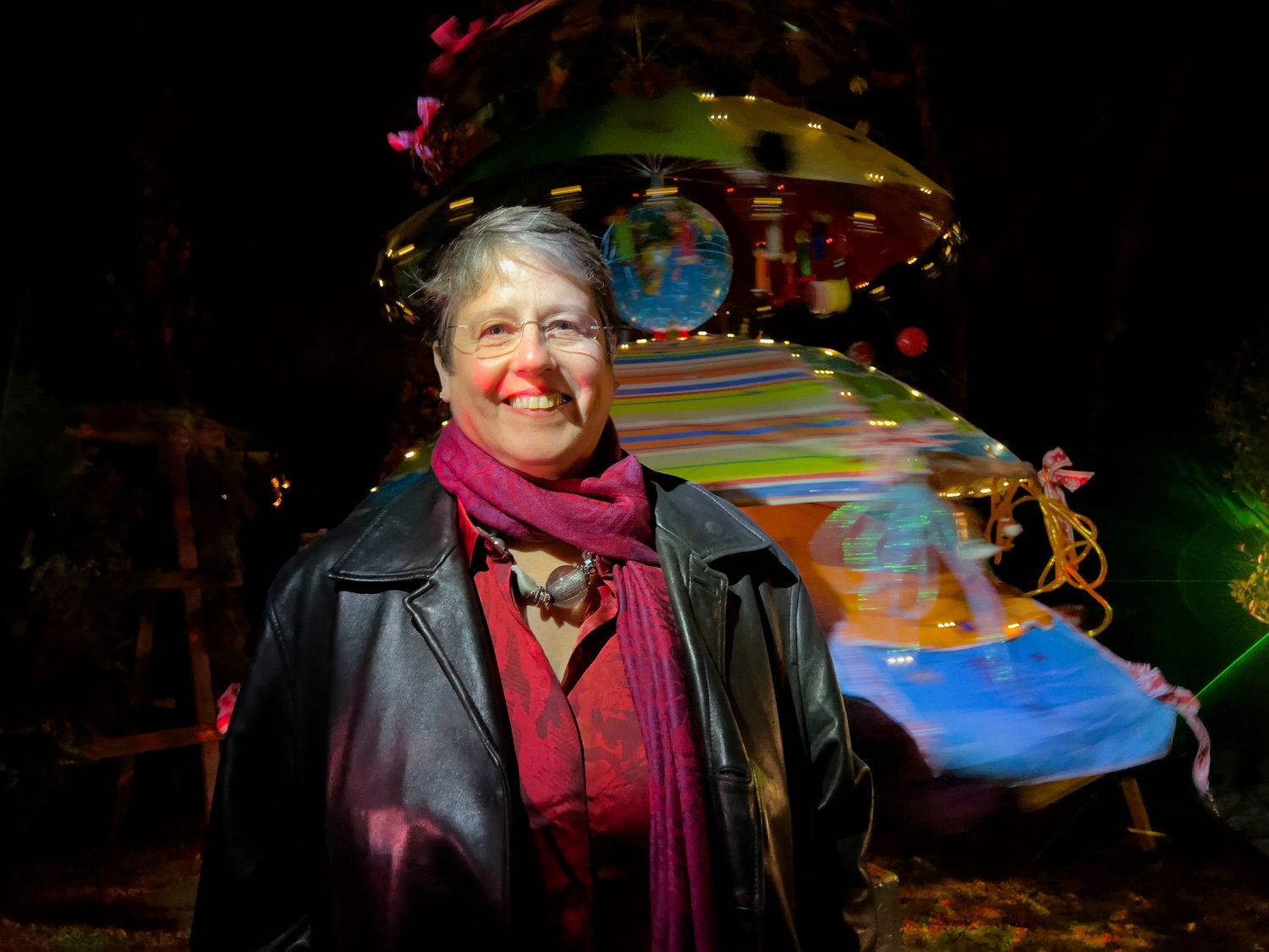 Carmen Grinkis of Tiverton and her tree "One World-Many Colors" 
Combined umbrellas, a globe, pez dispensers, music and a fan motor to make it spin.