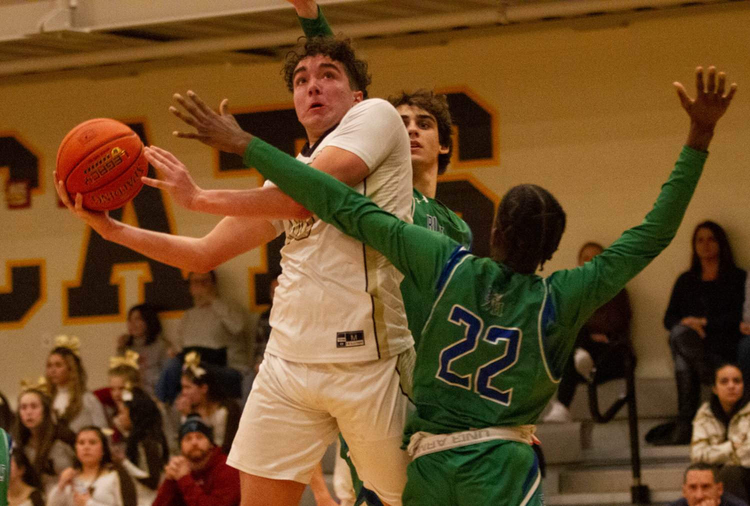 Max Morotti fights his way up to the basket in the second half.