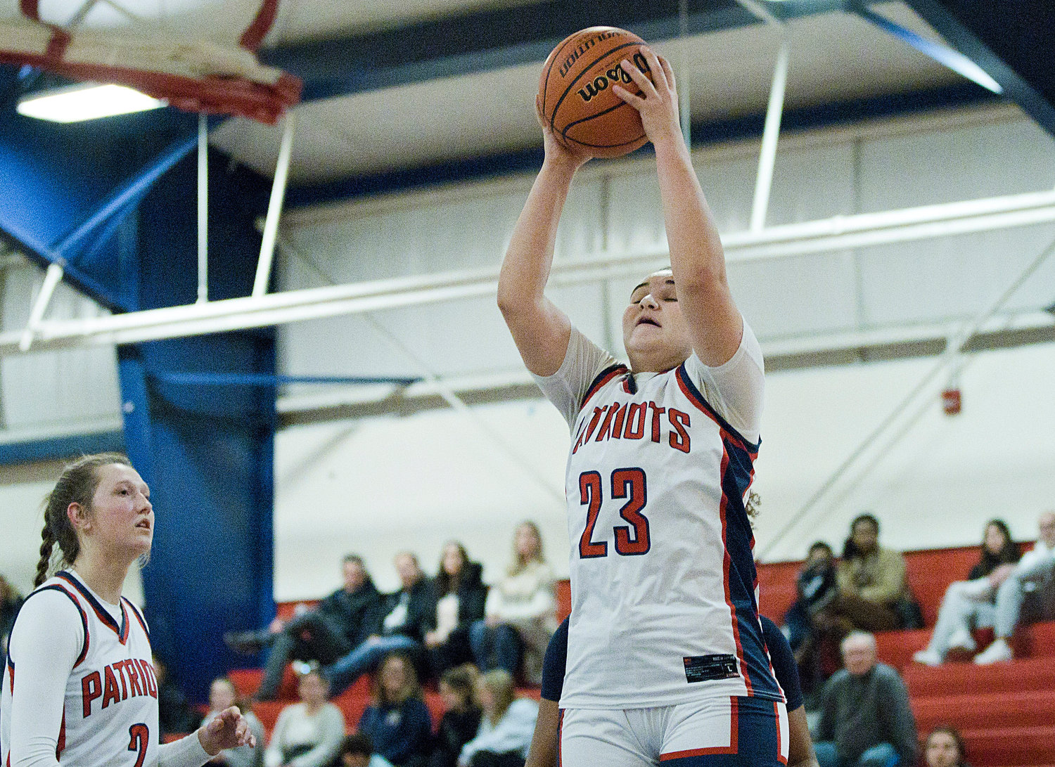 Emily Maiato grabs a rebound during the second half of Monday’s game against Barrington.