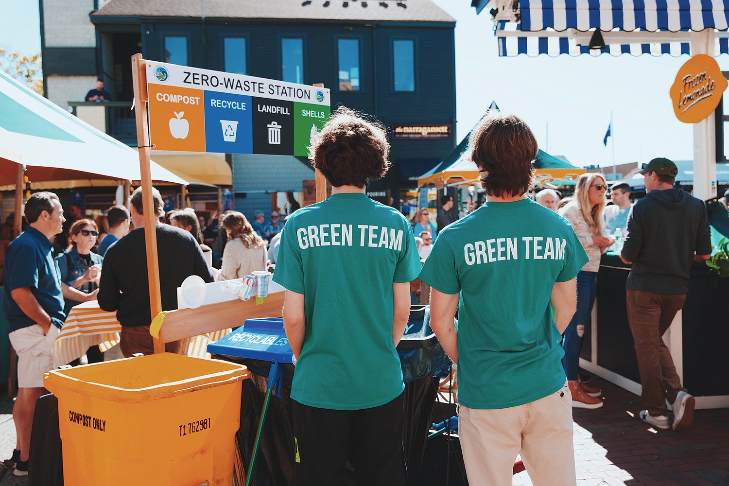 A couple of “Green Team” volunteers monitor a “Zero-Waste Station” at a Newport festival last summer. The event planner and volunteers worked together to separate the thousands of pounds of waste into — literally — separate buckets, so it could go into separate waste streams. Over the course of 15 such events, Clean Ocean Access was able to divert more than 26,000 pounds of waste from Rhode Island’s central landfill.