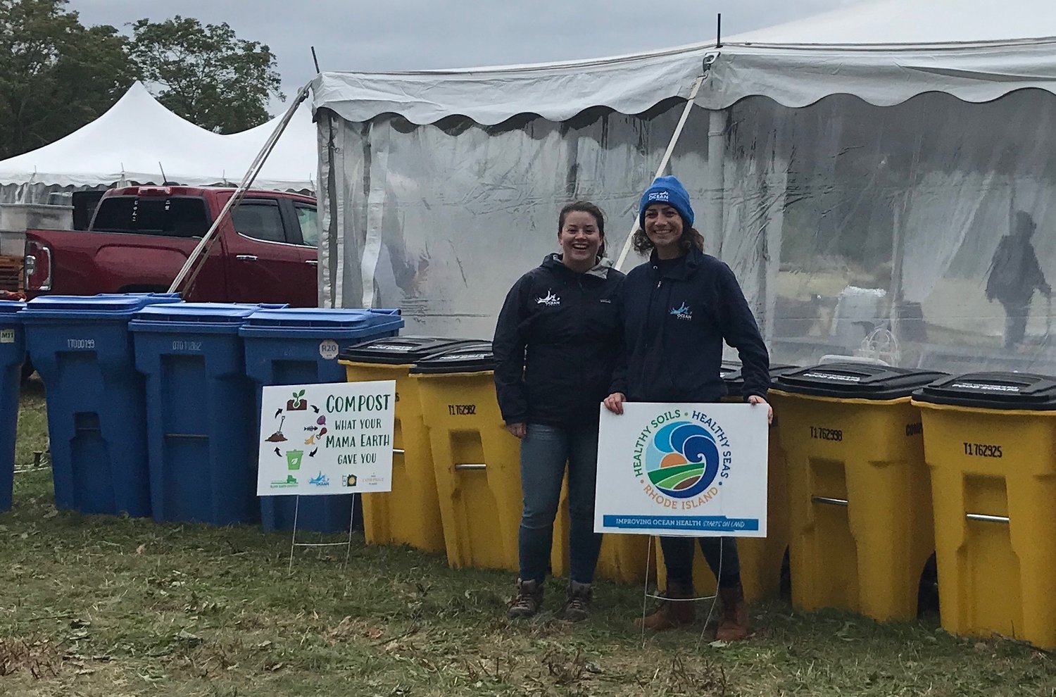 Eva Touhey (left) and Clean Ocean Access Program Manager Casey Tremper proudly do some of the dirty week, shown here at the Norman Bird Sanctuary Harvest Fair back in October.