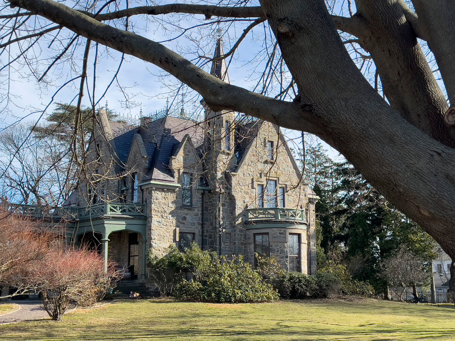 The Seven Oaks House, circa 1873, is a Gothic Revival home designed by the famous architect, James Renwick of New York, for former Rhode Island governor Augustus O. Bourn. It is a protected part of the town’s Historic District when it was created, and a development planned for a lot next-door was rejected based on that inclusion in 1987.
