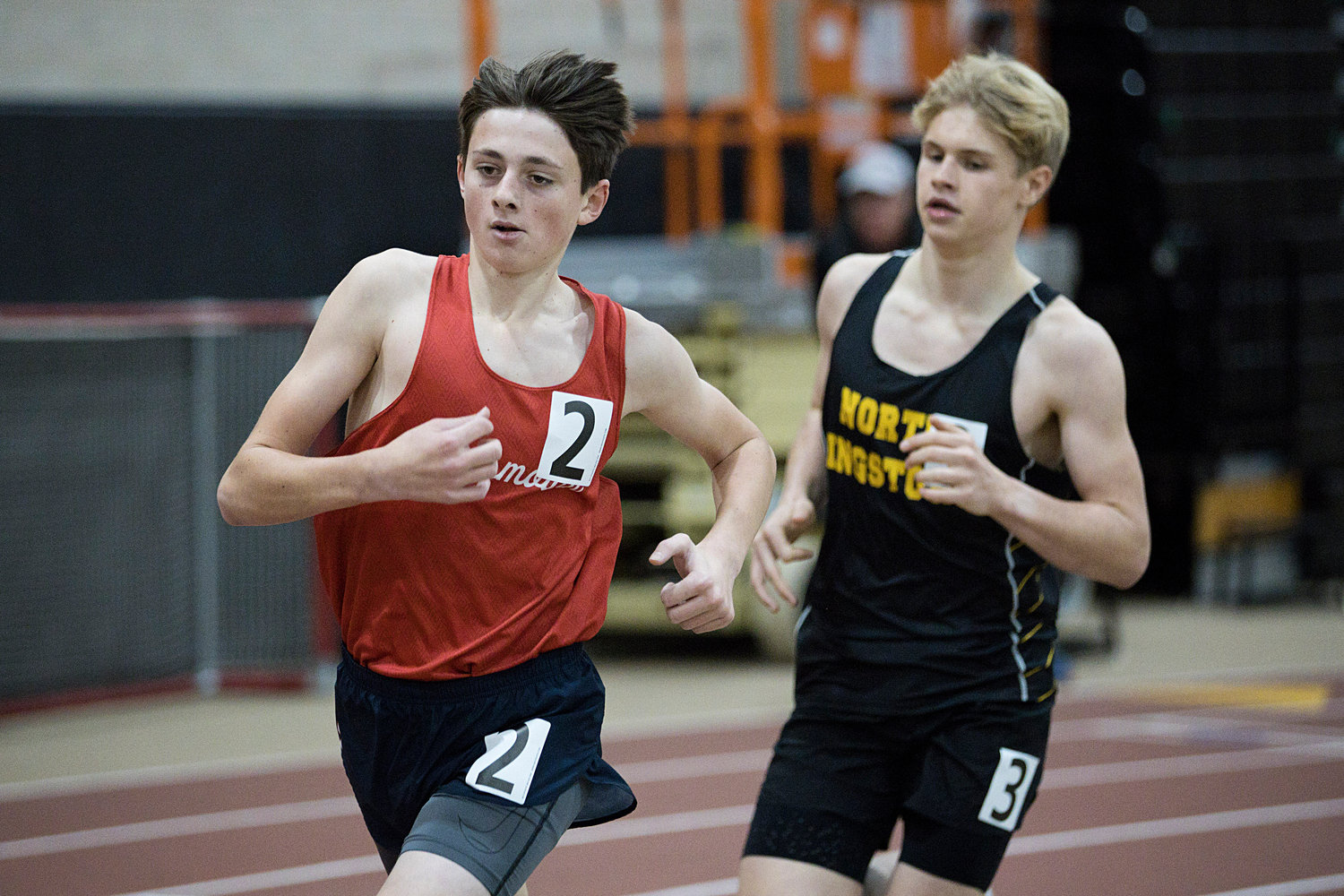 Portsmouth’s Sean Gray races ahead of a North Kingstown opponent while going on to win the 1,500-meter race with a time of 4:33.84.
