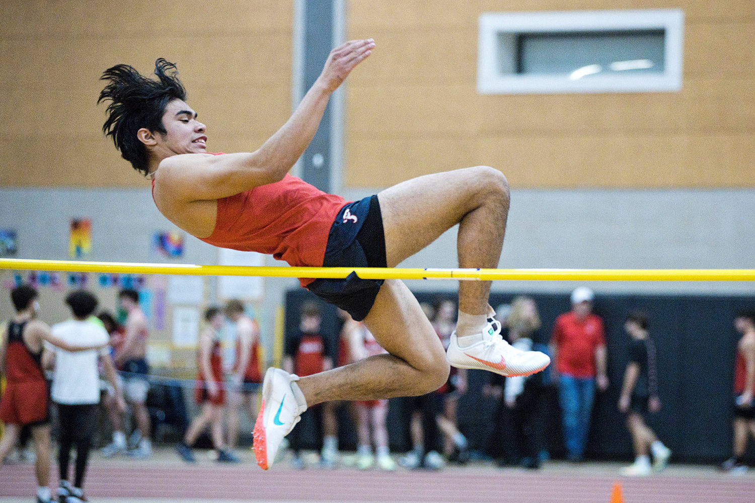 Tristan Thomas competes in the high jump during Friday’s meet.