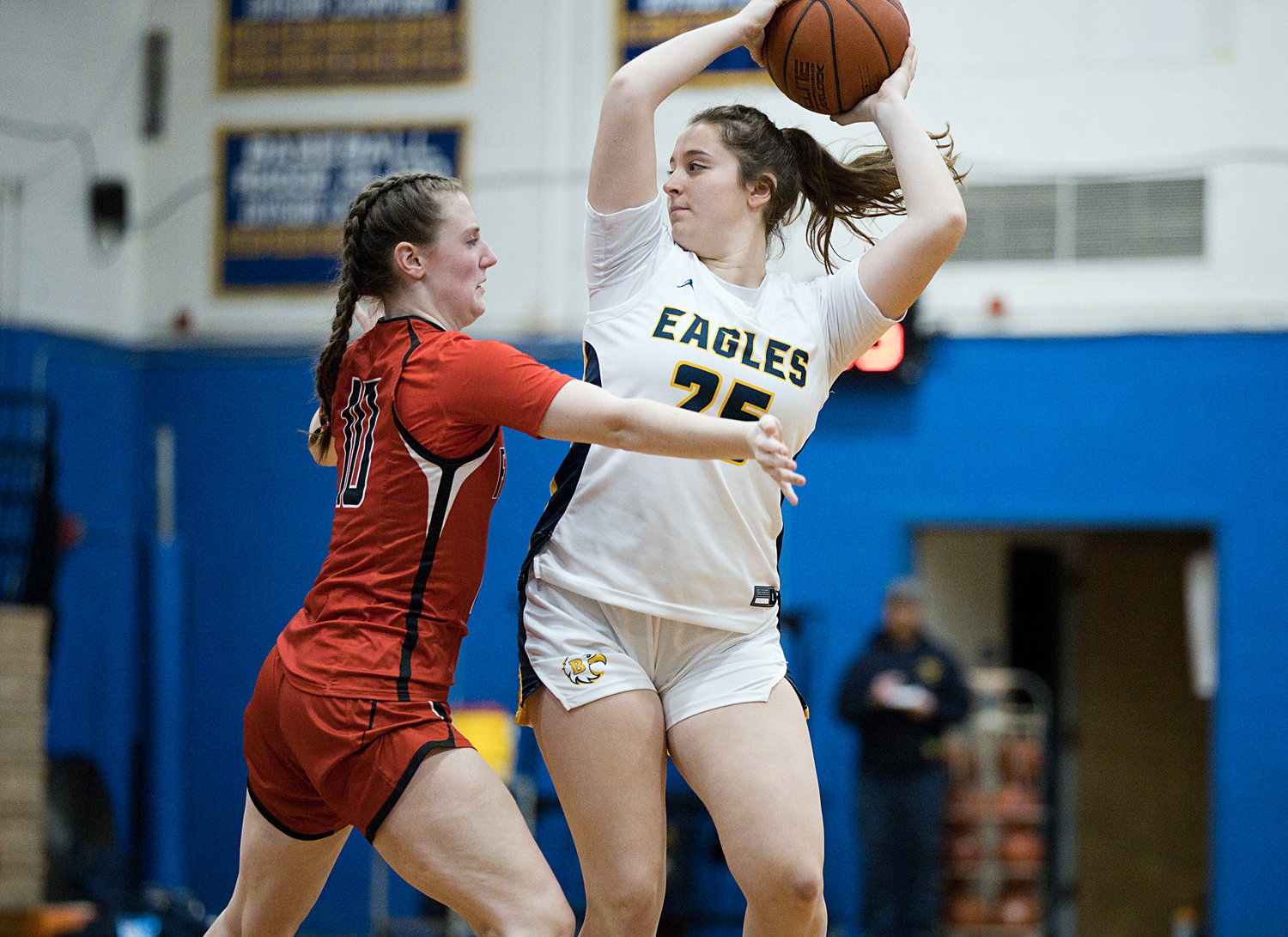 Emma Johnson holds the ball away from a Cranston West defender.