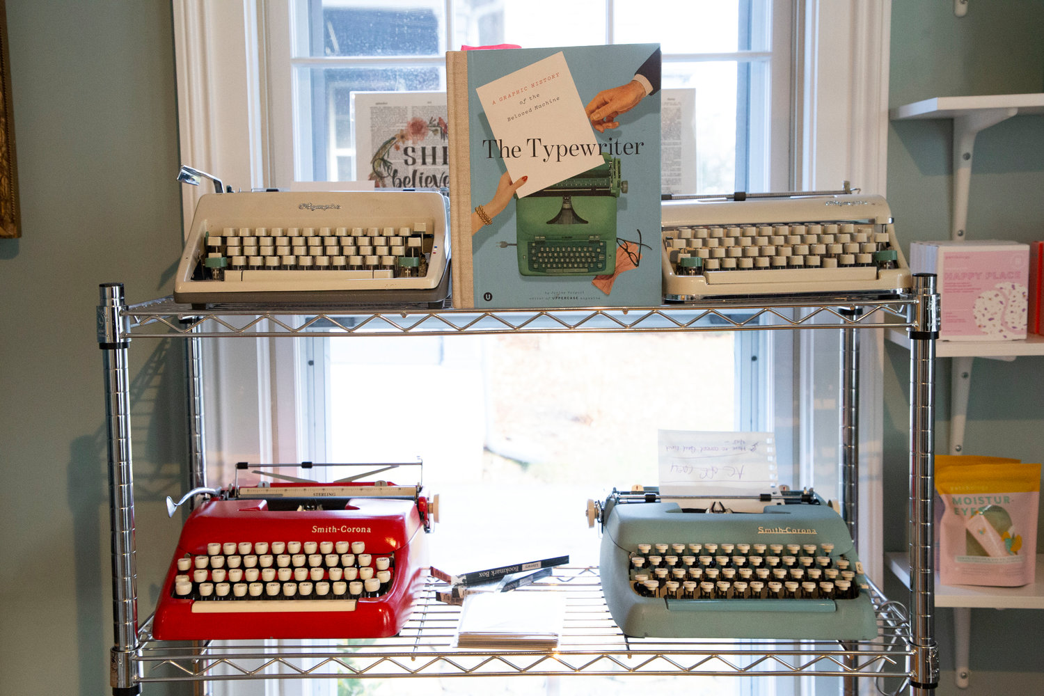 These colorful midcentury typewriters make a cheery display on the first floor. According to Alayne, manufacturers began to make colored typewriters when women started to go to college in greater numbers, believing that would make typing more appealing to women.