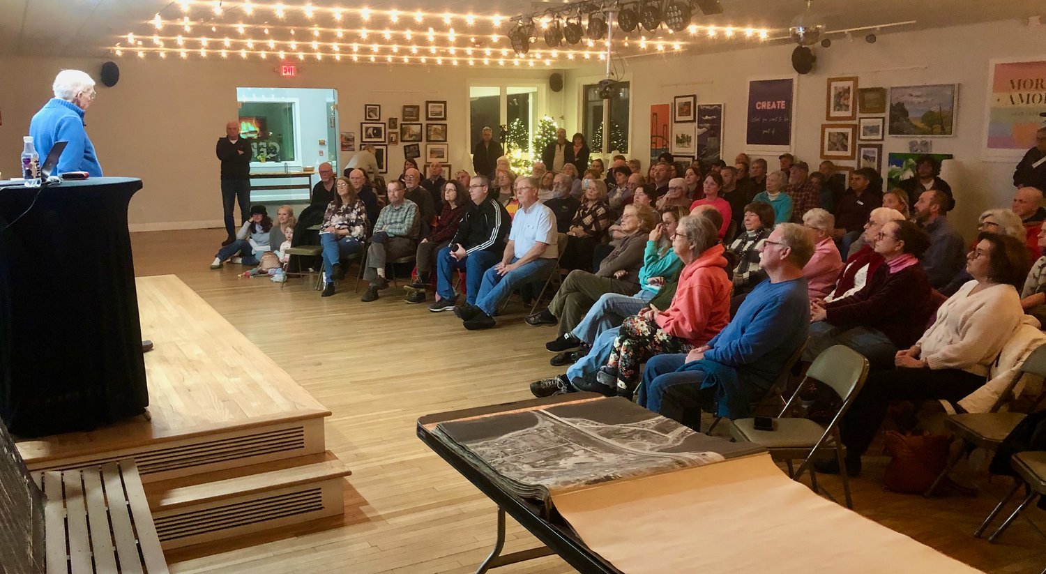 Town Historian Jim Garman (far left) speaks to about 100 people during his lecture on North Portsmouth history at the CFP Arts, Wellness, and Community Center in Common Fence Point on Wednesday, Jan. 25.