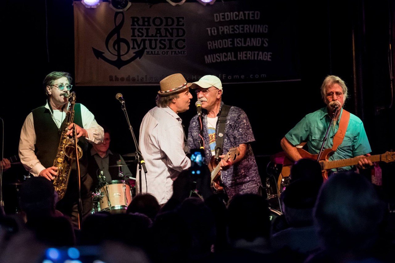 RIZZZ members (from left to right) Bob Weisberger, Klem Klimek, Dave Tanury and Jim Tait, shown performing during the band’s 2017 Rhode Island Music Hall of Fame induction, are back together for the group’s upcoming gig at The Met.