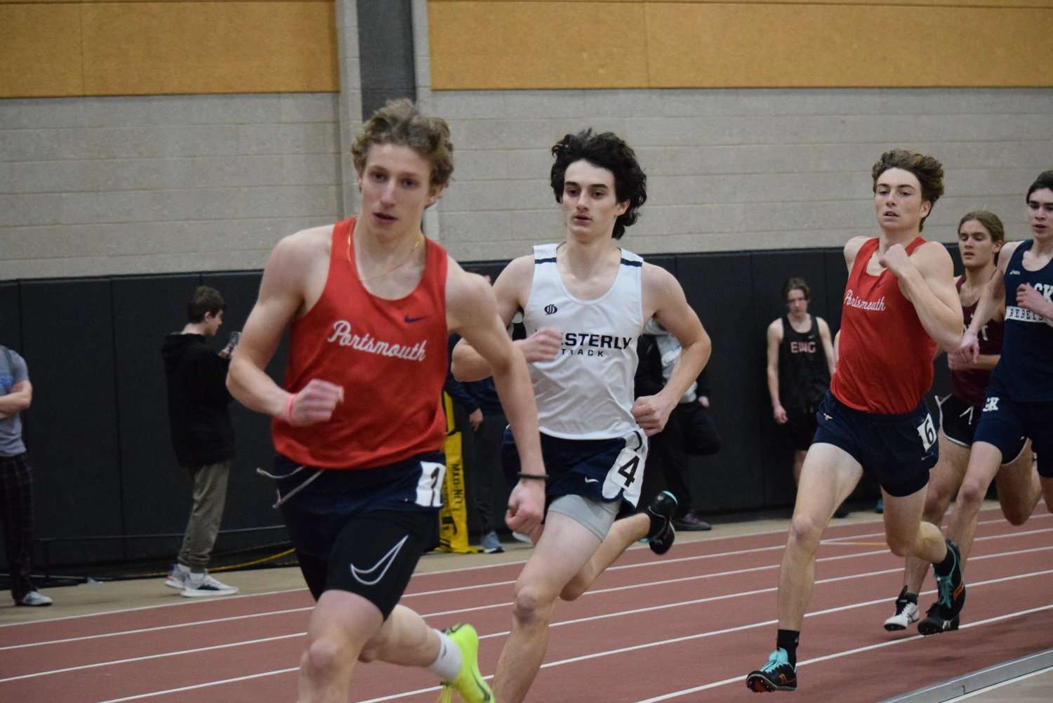 Portsmouth’s Oliver Tibbets (foreground) and Wake Zani (third from left) compete in the 600-meter run.