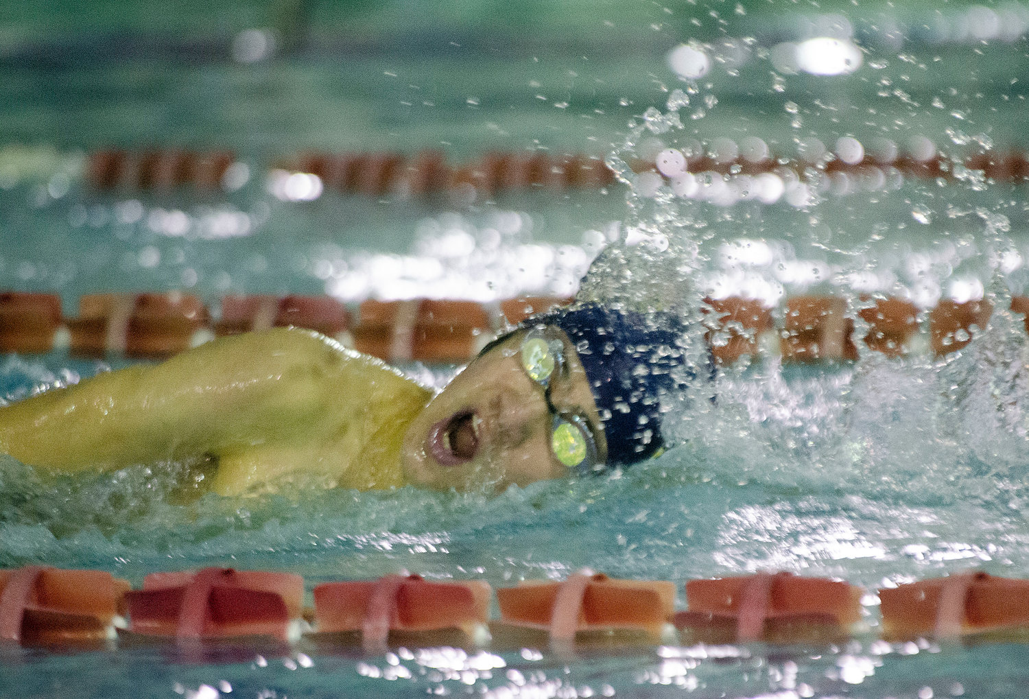 Ben Choi-Shattle races in the 500 free during Barrington's meet against Lincoln.