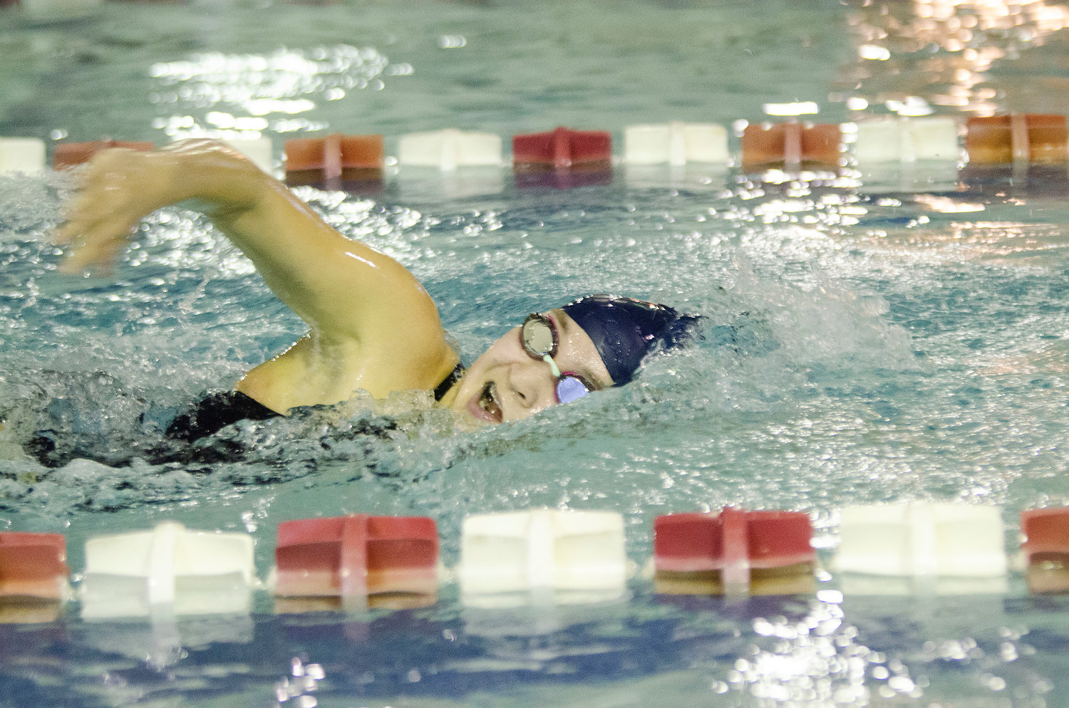 Lara Tolley competes in the 500 freestyle during Barrington's meet against Lincoln.