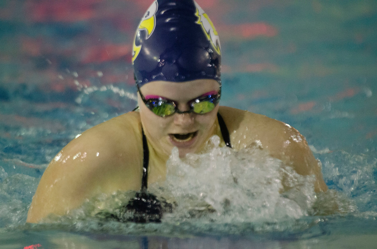 Barrington High School's Ava Webster competes in a breaststroke event during the Eagles' meet against Lincoln.