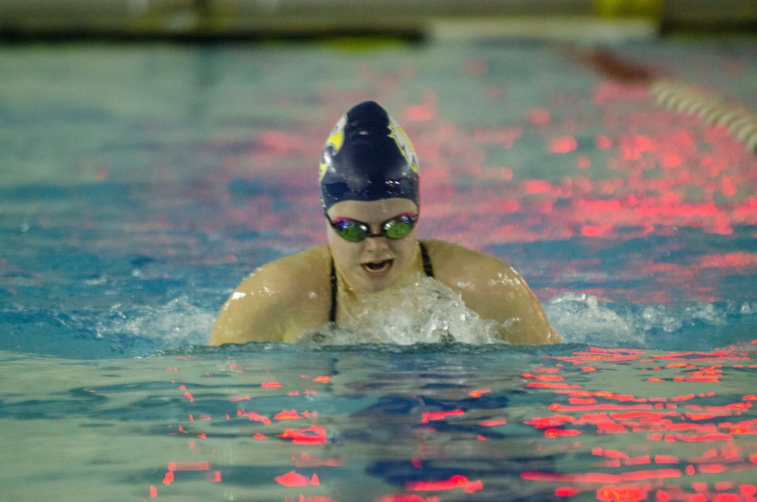 Barrington High School's Ava Webster competes in a breaststroke event during the Eagles' meet against Lincoln.
