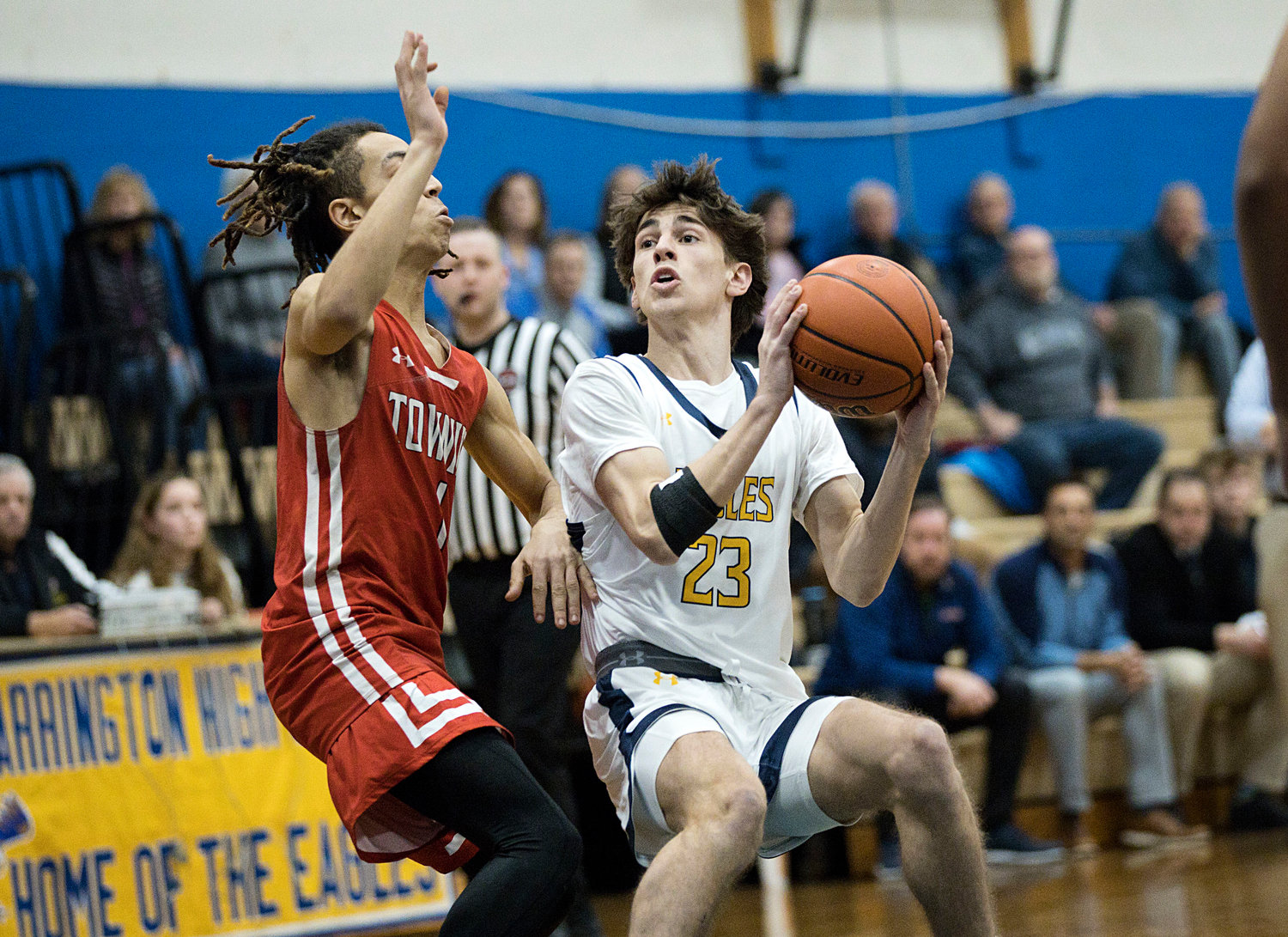 Matt Raffa eyes the hoop while pressured by an East Providence opponent.