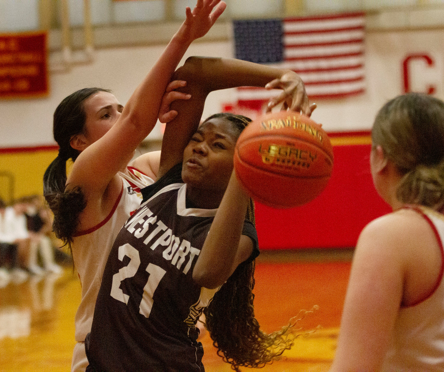 Jenna Egbe fights for a rebound. The tall sophomore led the team with 9 rebounds.