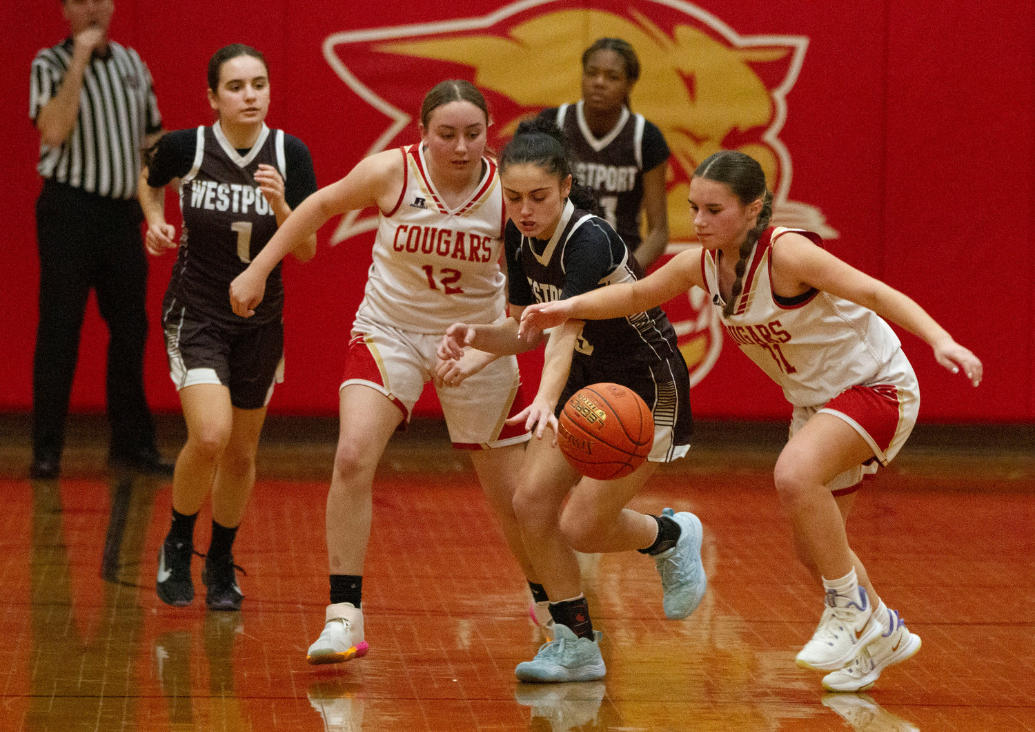 Korynne Holden makes a steal during the Wildcats' game at Bishop Connolly on Wednesday afternoon.