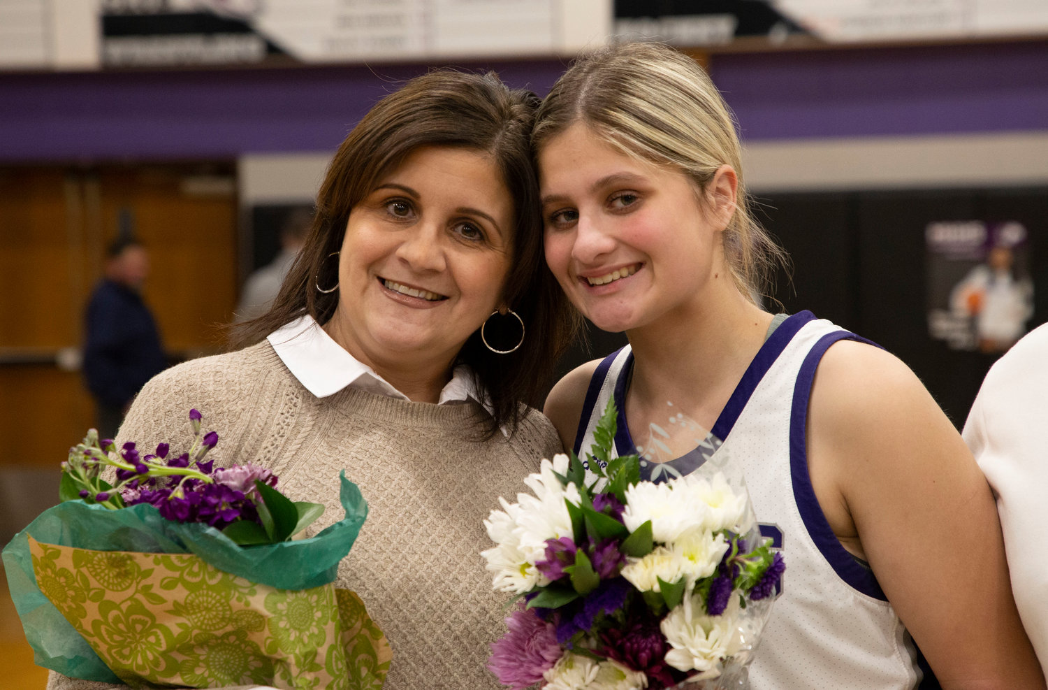 Abby Razzino poses for a photo with mom.