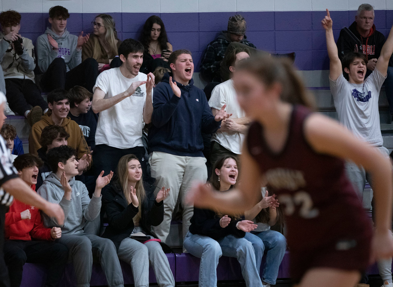 James Rustici, George Piper, Jamison Canario, Nick Andreozzi and the dog pound cheer on the Huskies.