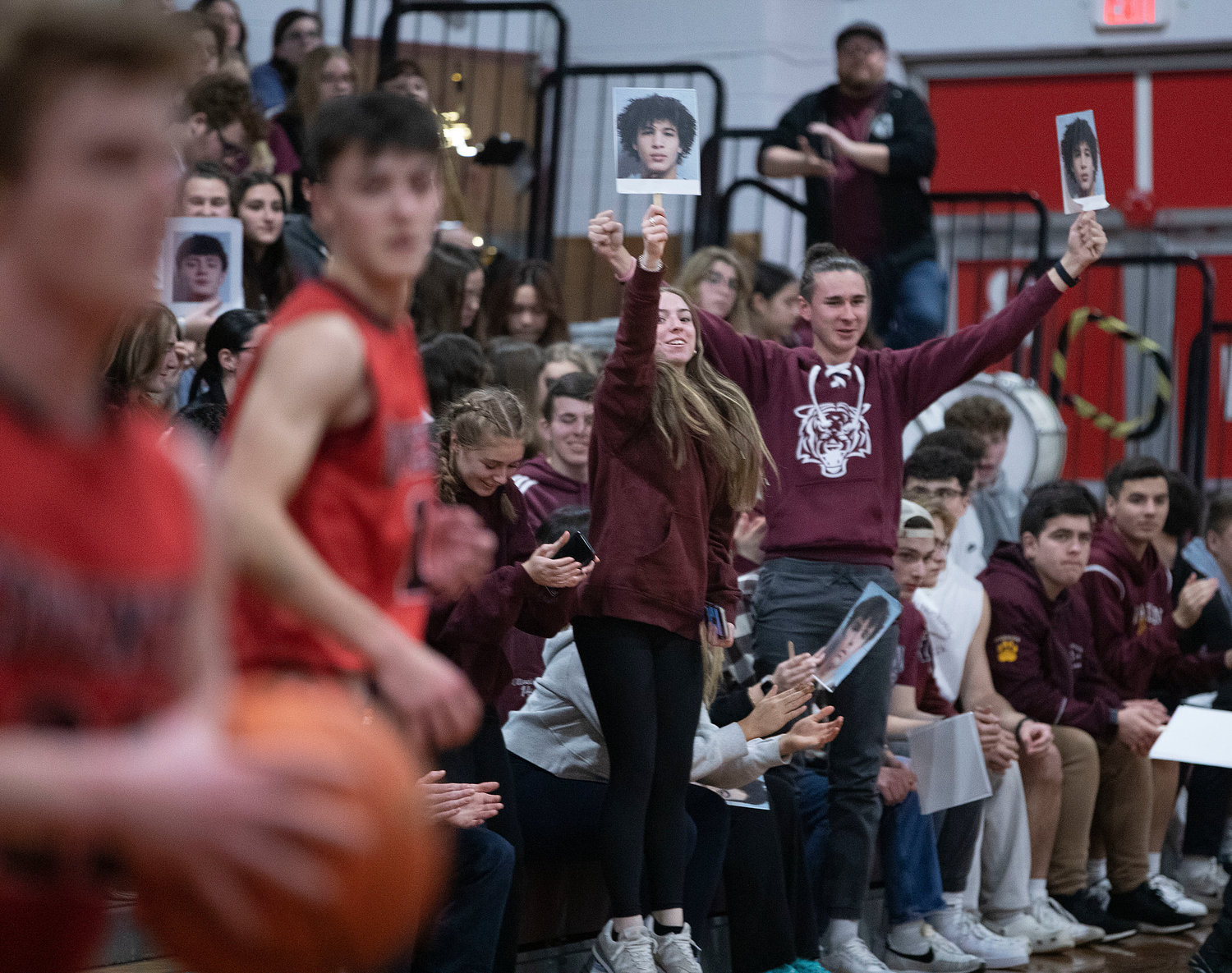 The senior night crowd cheer on senior point guard Tristan White after he drove in for a layup in the second half.