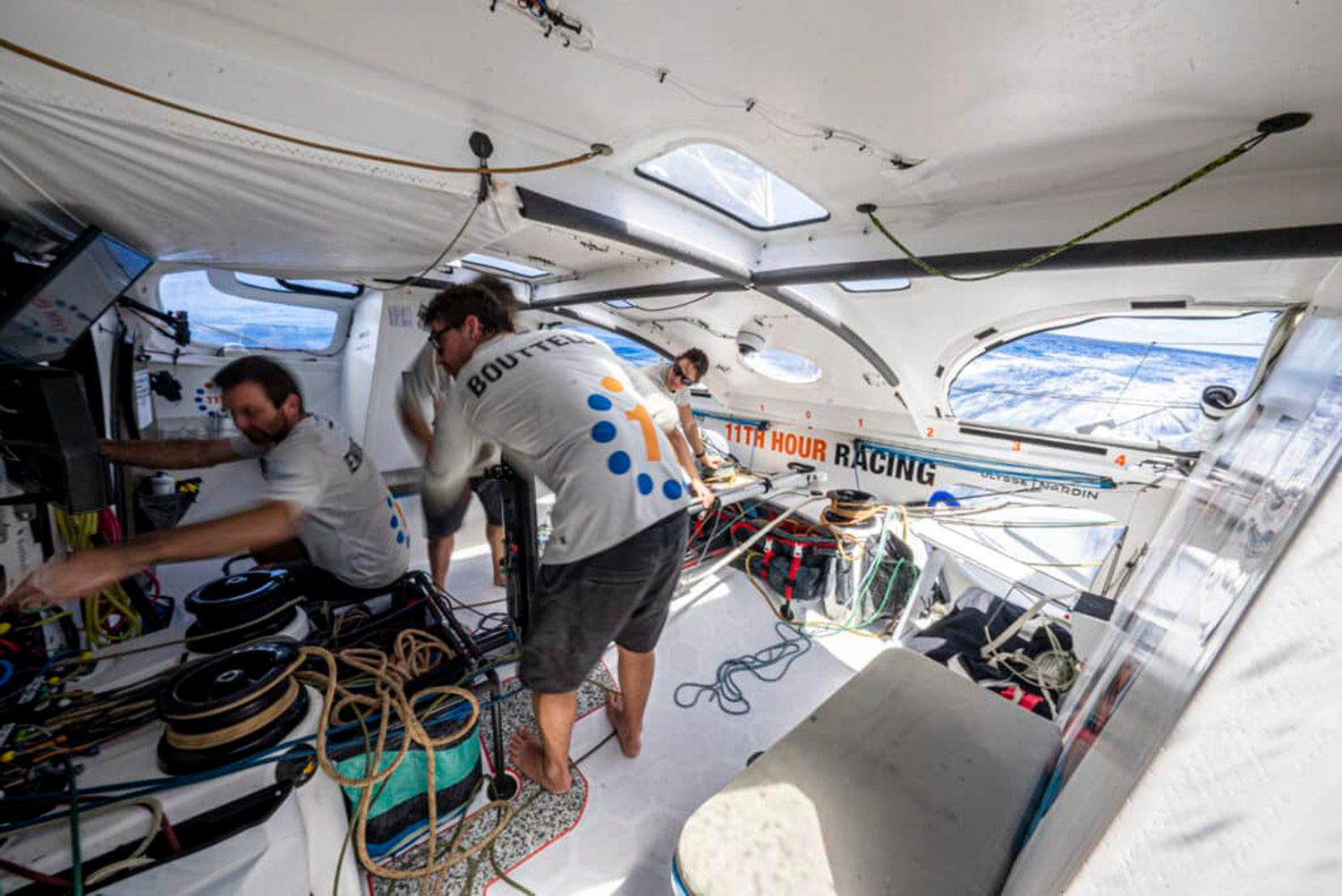 04 February 2023, Onboard 11th Hour Racing Team during Leg 2 from Sao Vicente, Cabo Verde, to Cape Town, South Africa...The team readies the autopilot-driven Malama for a gybe in a rare flurry of mechanical movement.